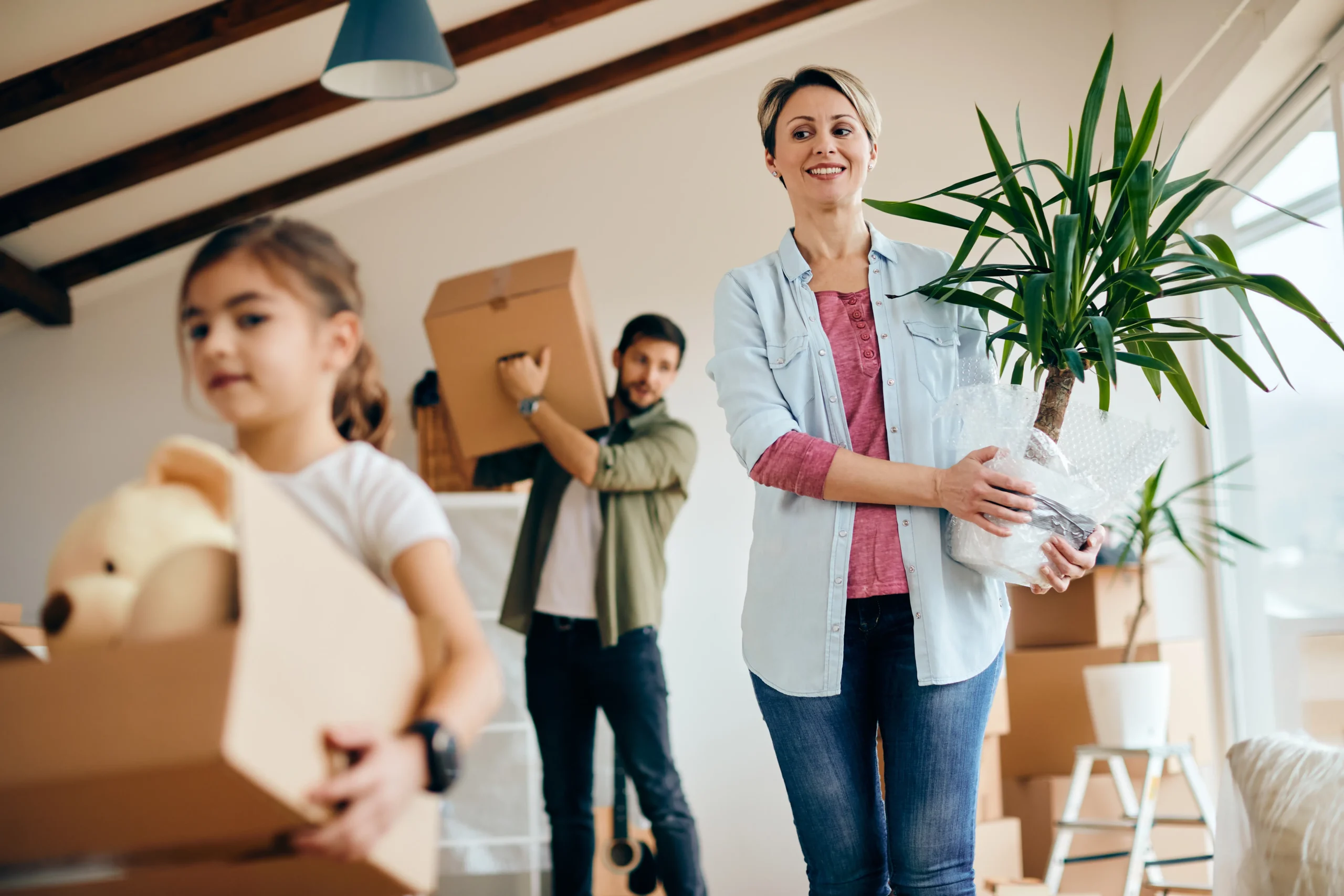 view-family-moving-into-new-home